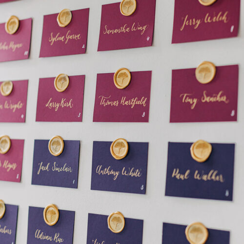 Jewel Toned Escort Cards with Gold Calligraphy and Wax Seal at Hangar 9 in San Antonio Texas by CalliRosa