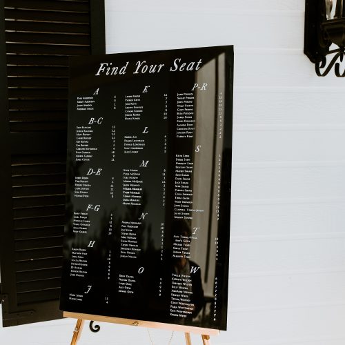 Black Acrylic Seating Chart for Black Tie Wedding in Texas Hill Country by CalliRosa Calligrapher